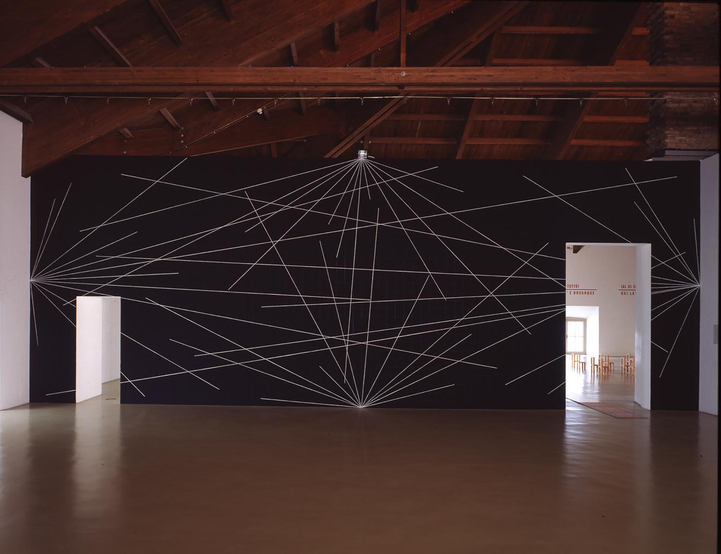 Sol LeWitt, A six inch (15 cm) grid covering each of the four black walls. White lines to points on the grids. 1st wall: 24 lines from the center; 2nd wall: 12 lines from the midpoint of each of the sides; 3rd wall: 12 lines from each corner; 4th wall: 24 lines from the center, 12 lines from the midpoint of each of the sides, 12 lines from each corner, 1976 and Dennis Oppenheim, Lecture #1, 1976-1983